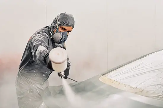 Spray Painting Inside a Booth